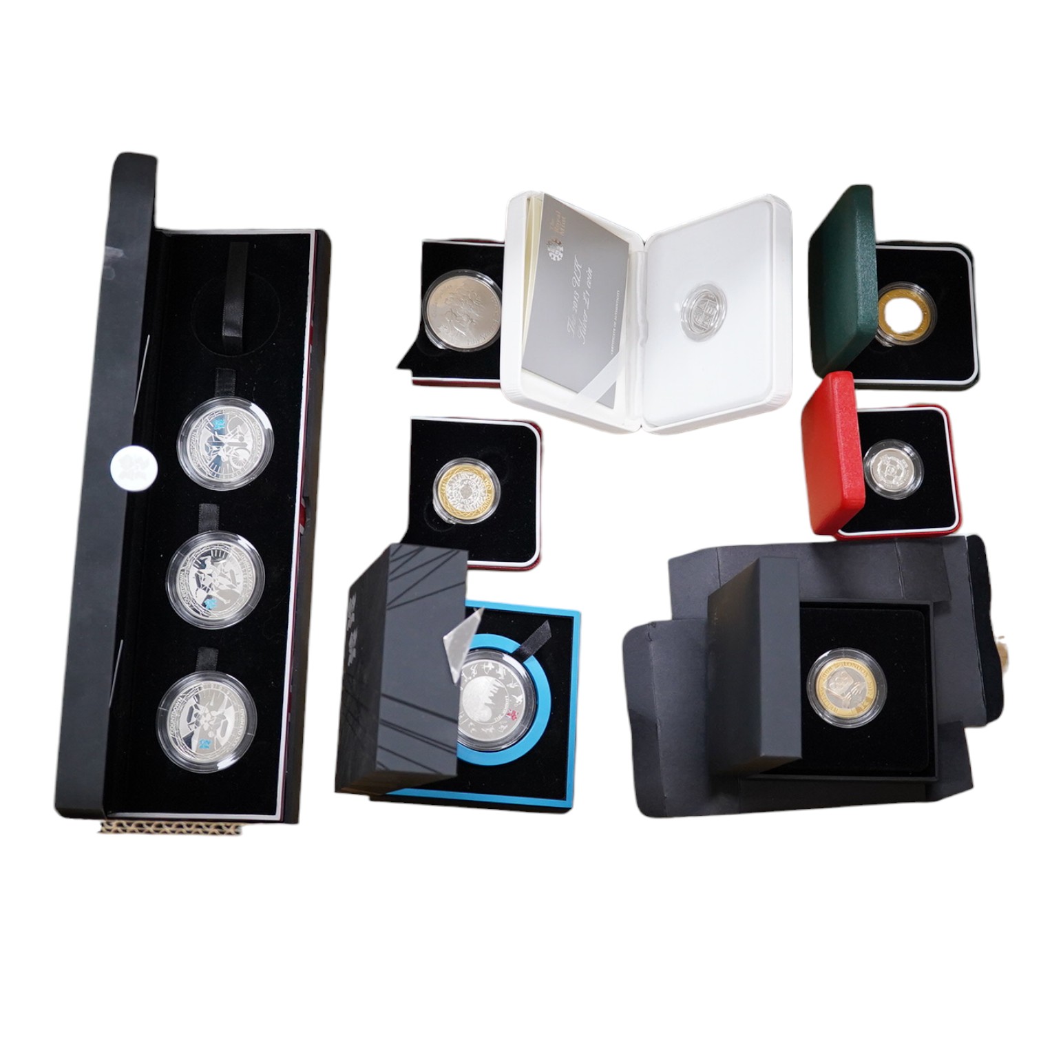 Royal Mint UK proof silver coins , to include five countdown to London 2012 £5 coins 1997, 2008 and 2005 £2 coins, Golden Jubilee 2002 commemorative silver medal 2013 and 2001 £1 coins, all cased, most with certificates